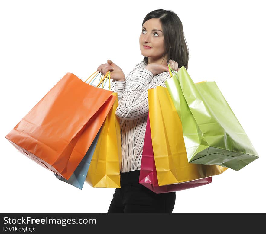 Young adult girl with colored bags