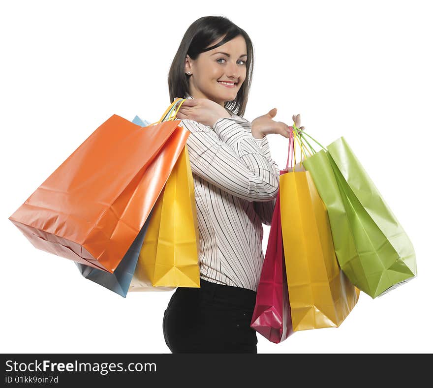 Young adult girl with colored bags