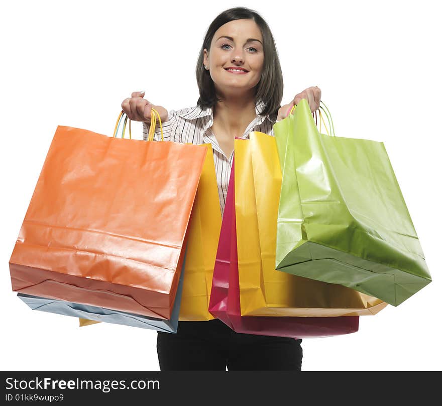 Young adult girl with colored bags