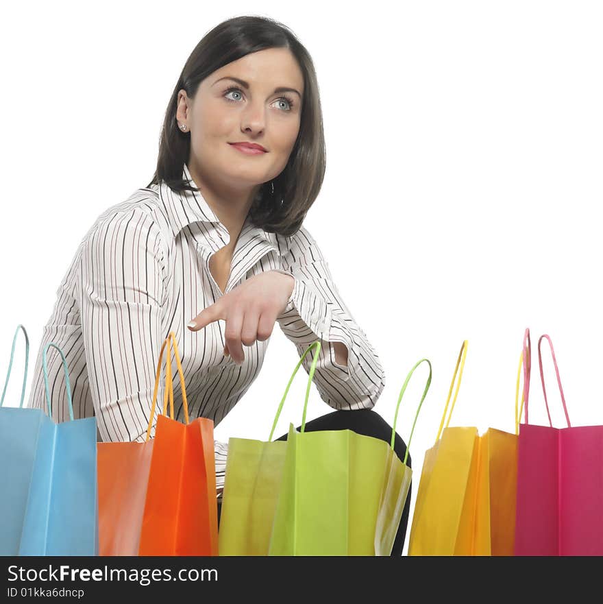 Young adult girl with colored bags