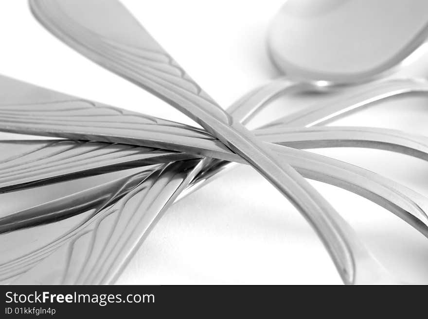 Metal spoon on a white background