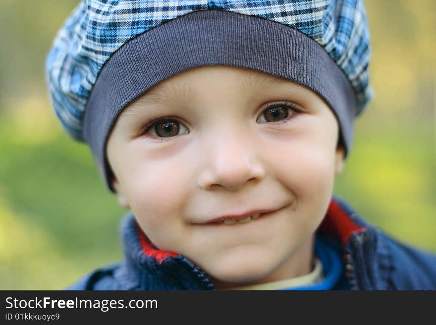 Little baby boy in autumn park. Little baby boy in autumn park