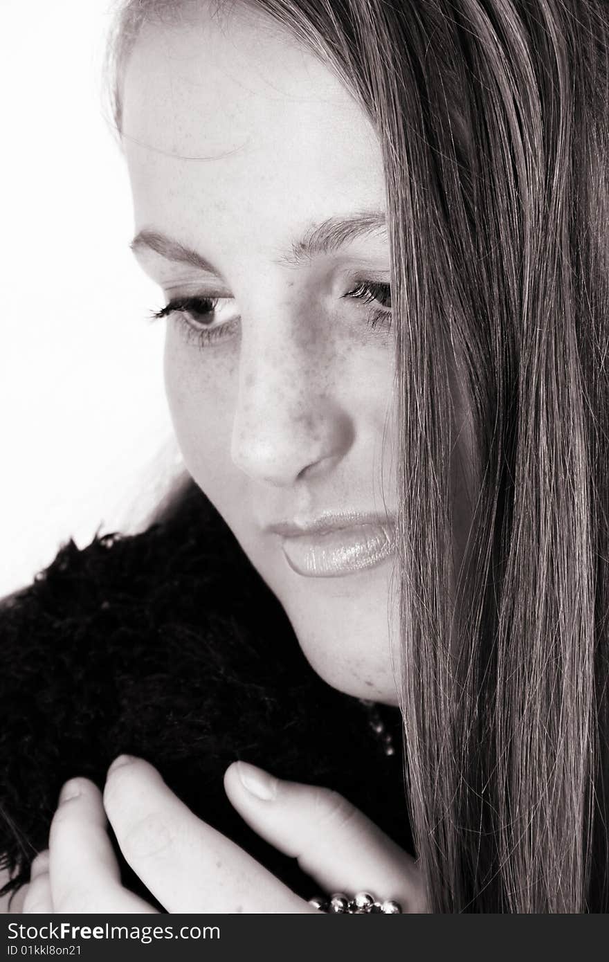 Close up of female teenager against a white background. Close up of female teenager against a white background