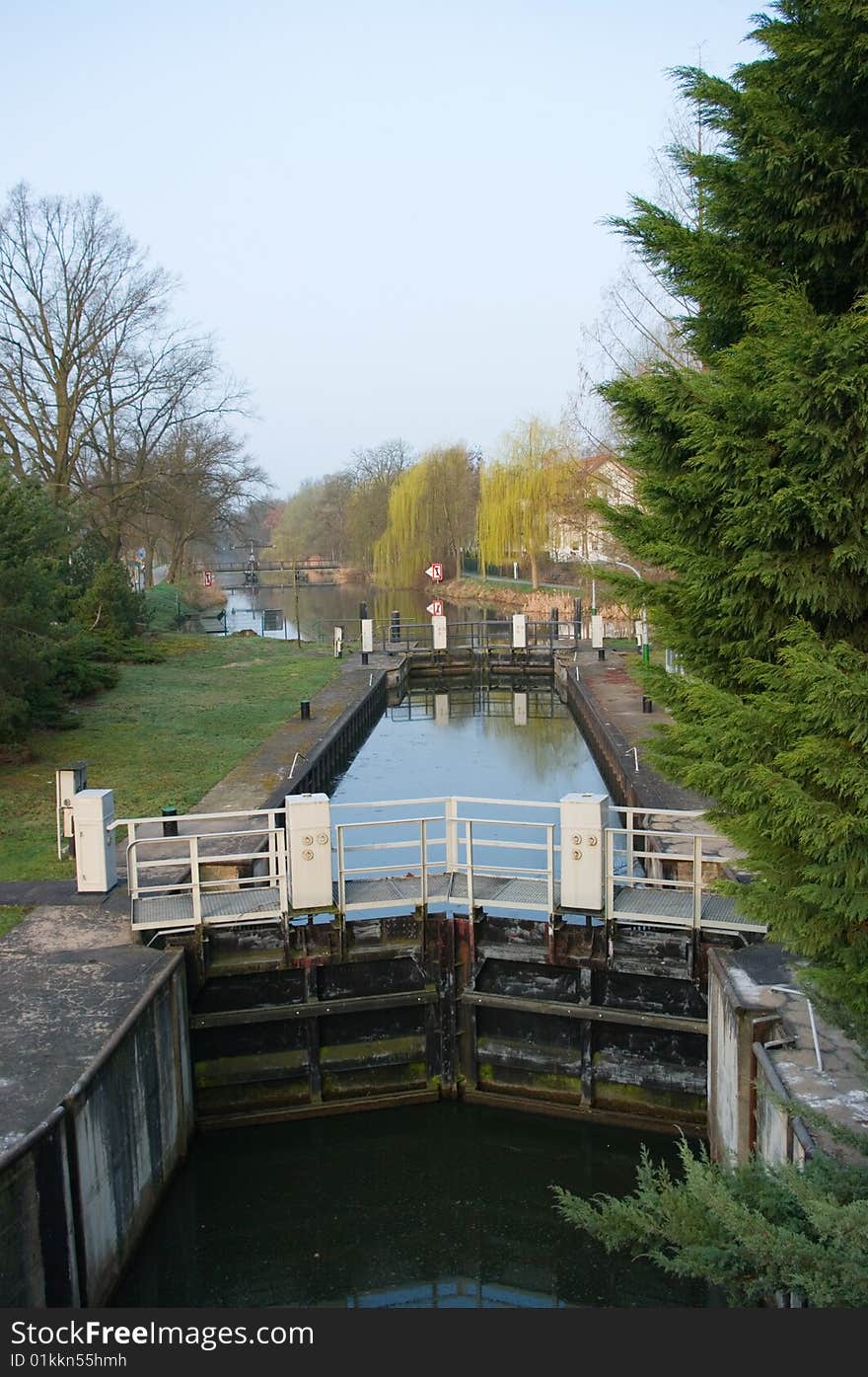 A lock is in a channel, water-way