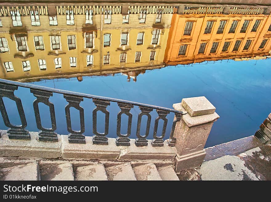 Old houses reflected in canal water, Saint Petersburg. Old houses reflected in canal water, Saint Petersburg