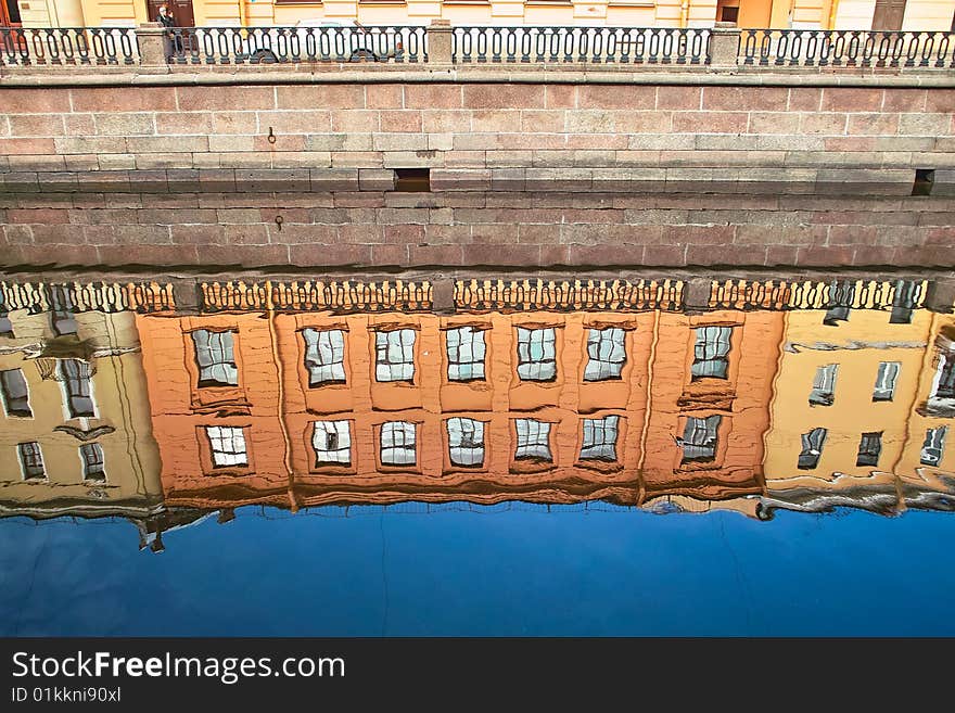 Old houses reflected in canal water, Saint Petersburg. Old houses reflected in canal water, Saint Petersburg