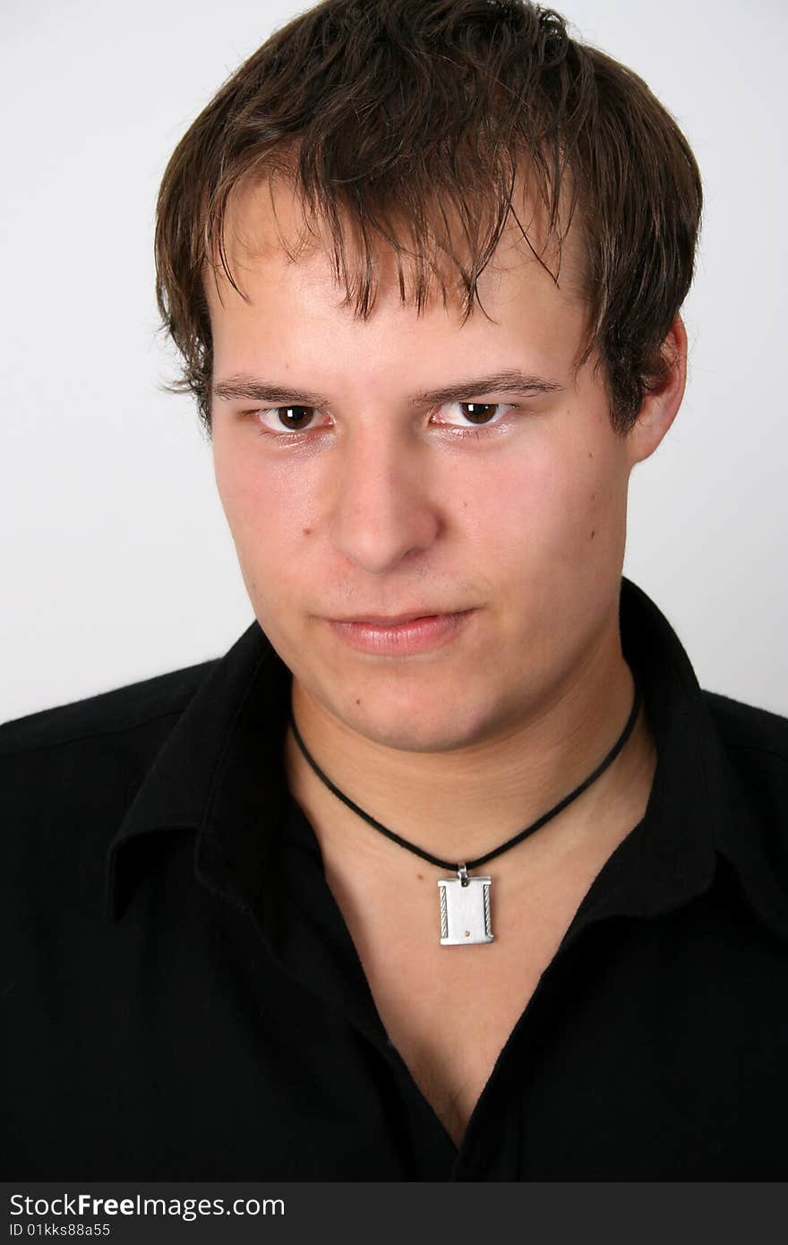 Male model against a white wall background