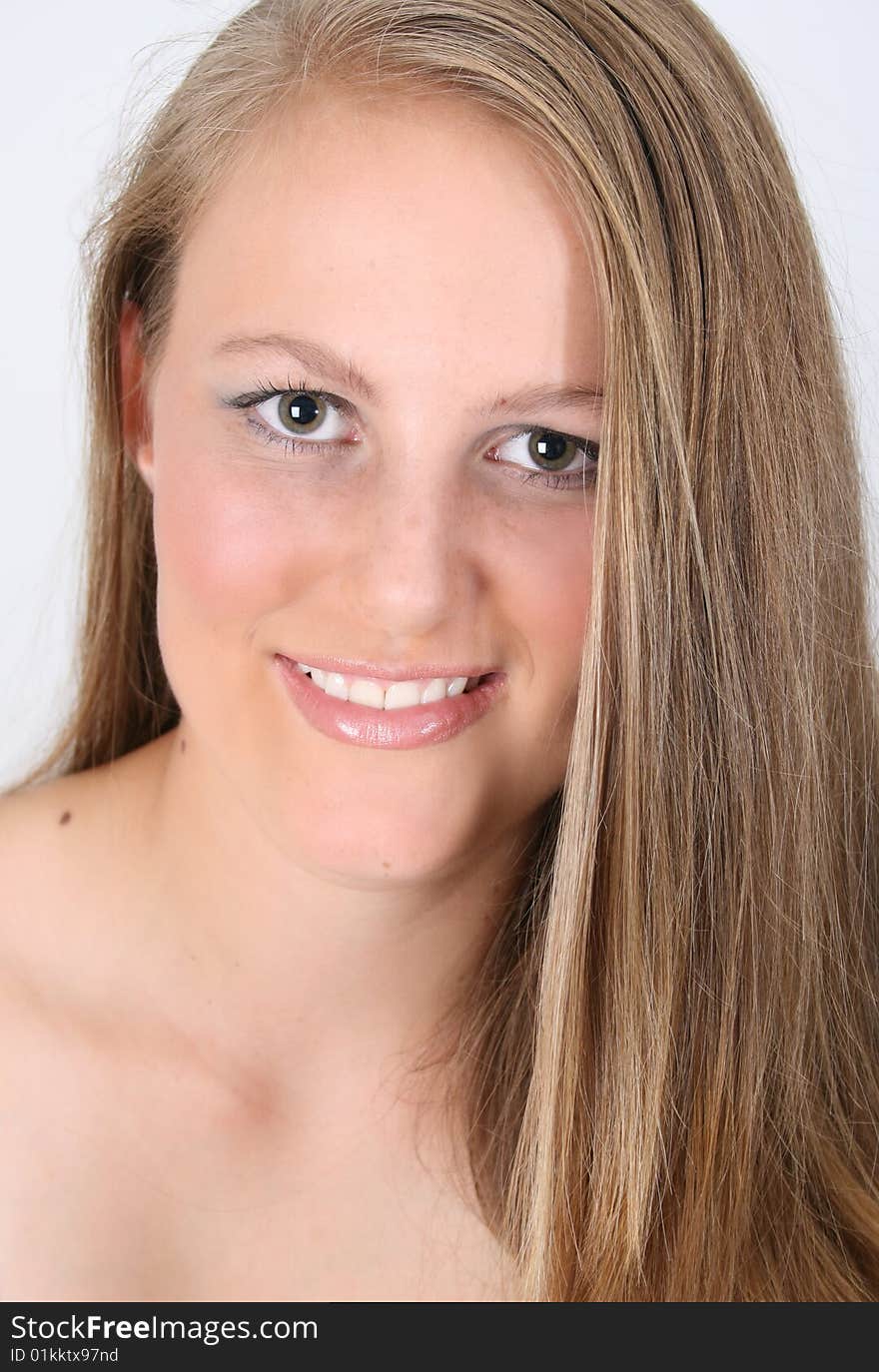 Close up of female teenager against a white background. Close up of female teenager against a white background