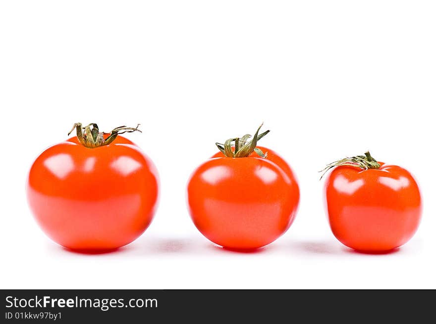 Tomatoes on the white background