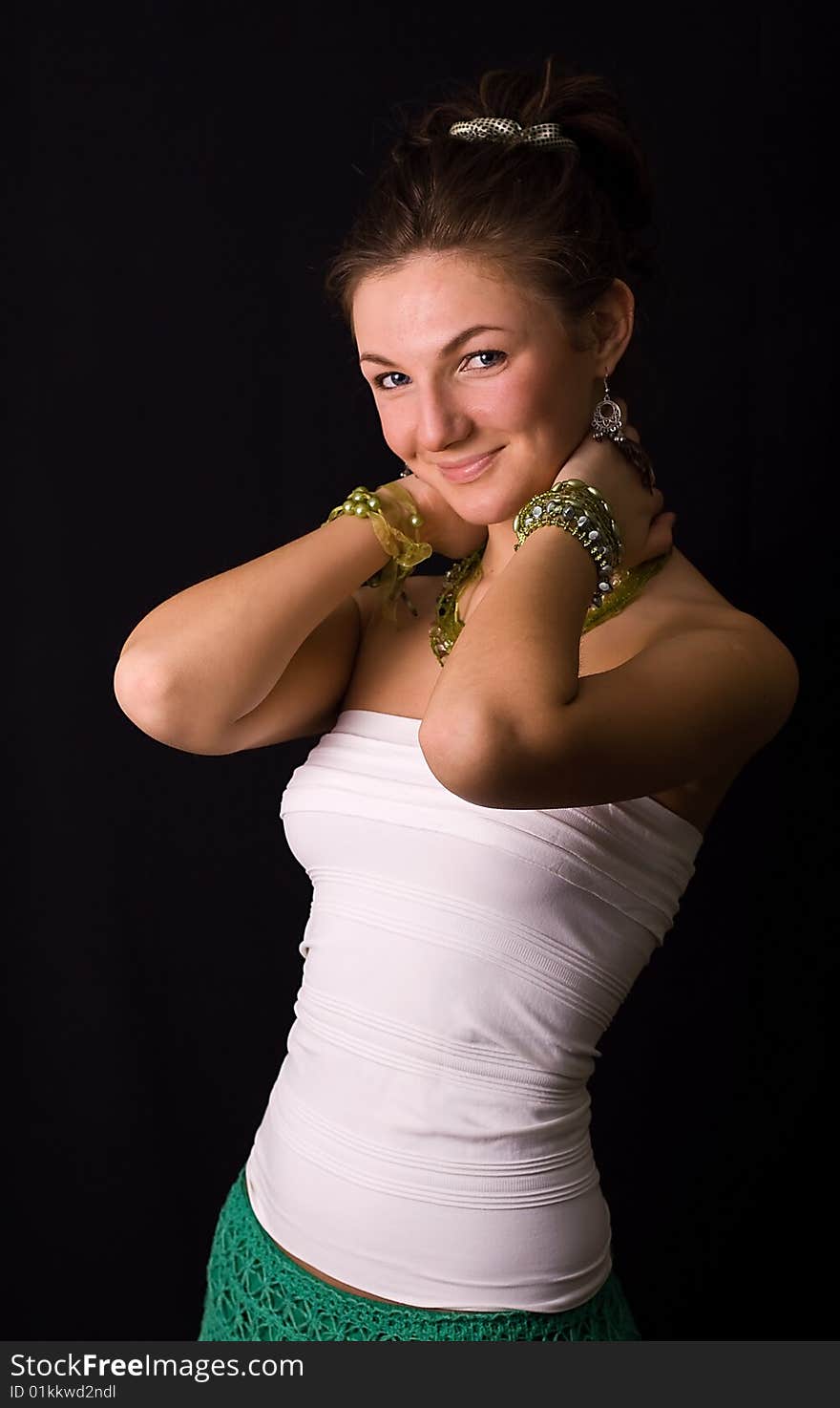 Nice young girl against a black background. Nice young girl against a black background