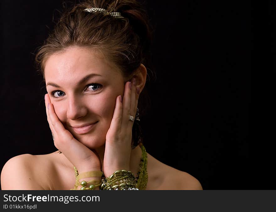 Nice young girl against a black background. Nice young girl against a black background