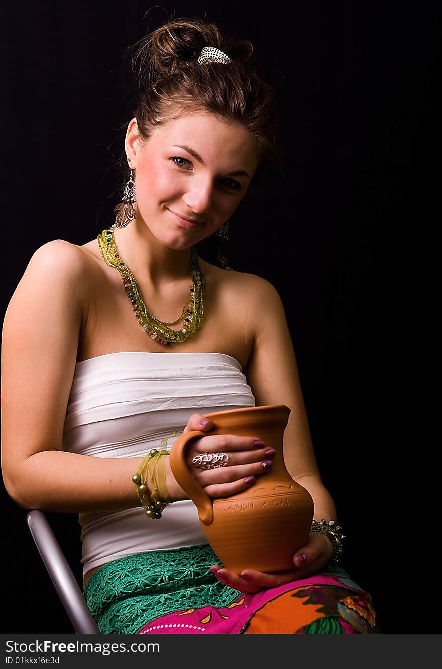 Nice young girl against a black background. Nice young girl against a black background