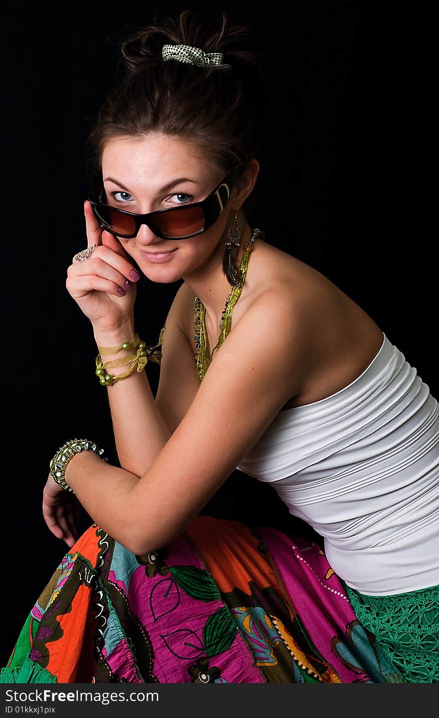 Nice young girl against a black background. Nice young girl against a black background