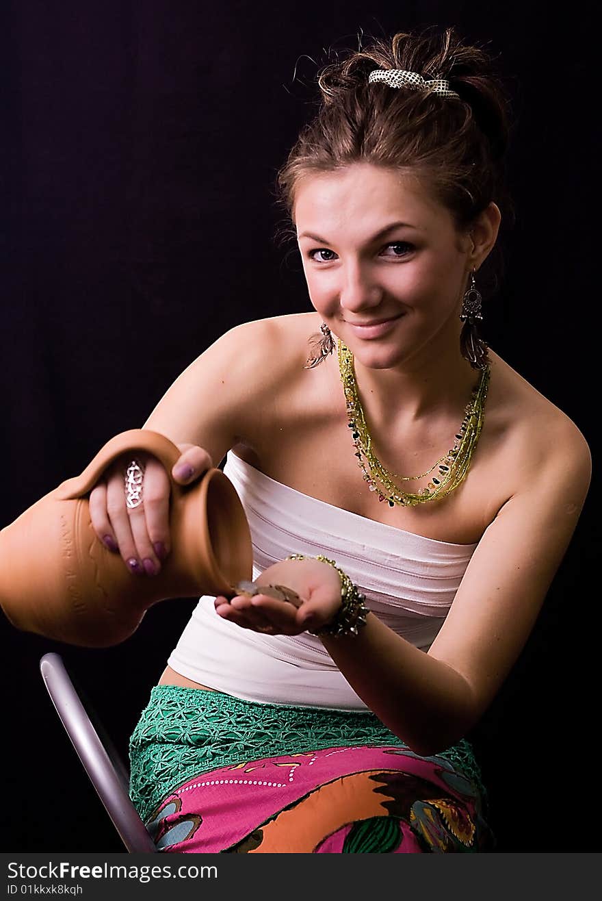 Nice young girl against a black background. Nice young girl against a black background