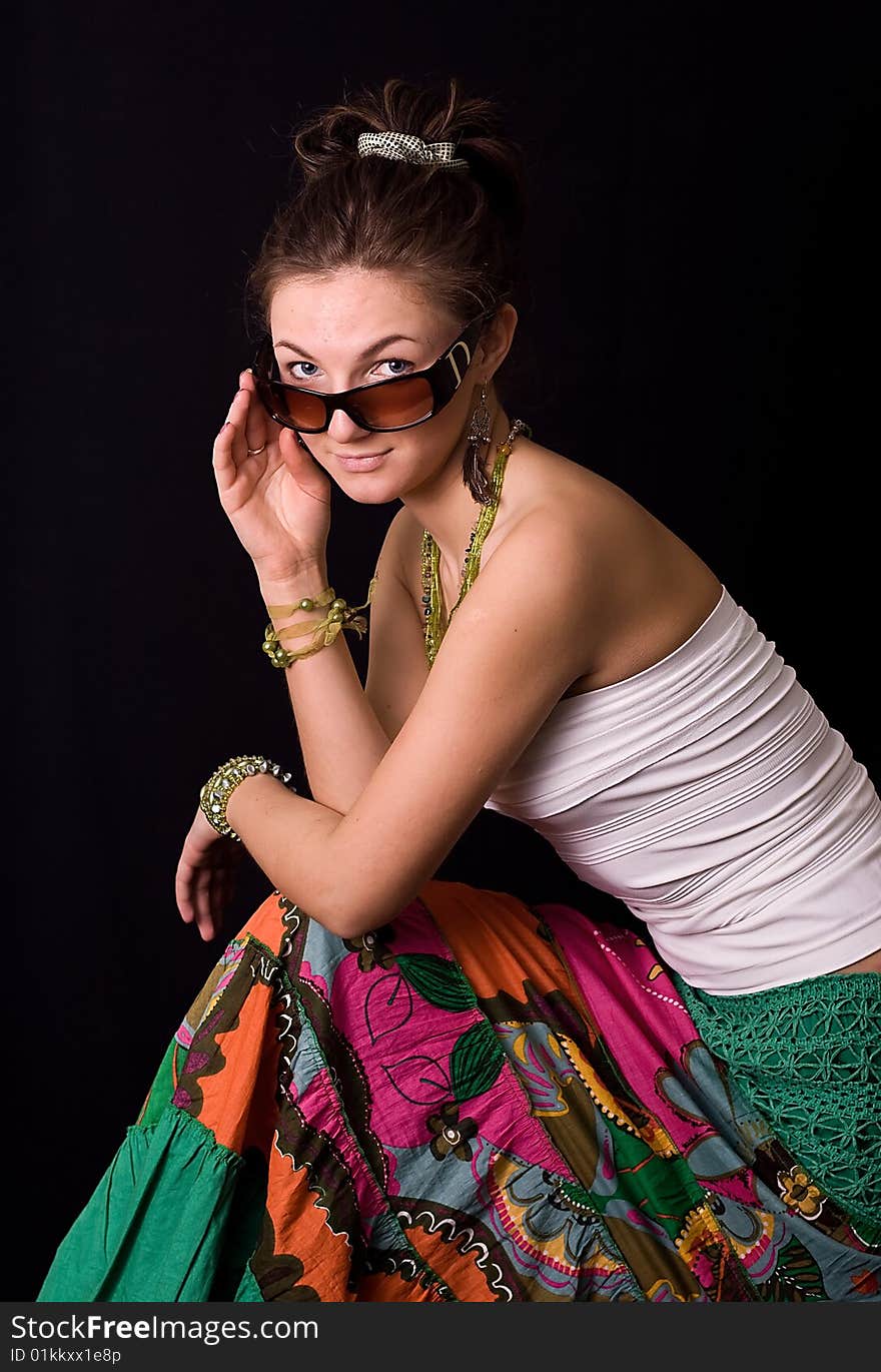 Nice young girl against a black background. Nice young girl against a black background