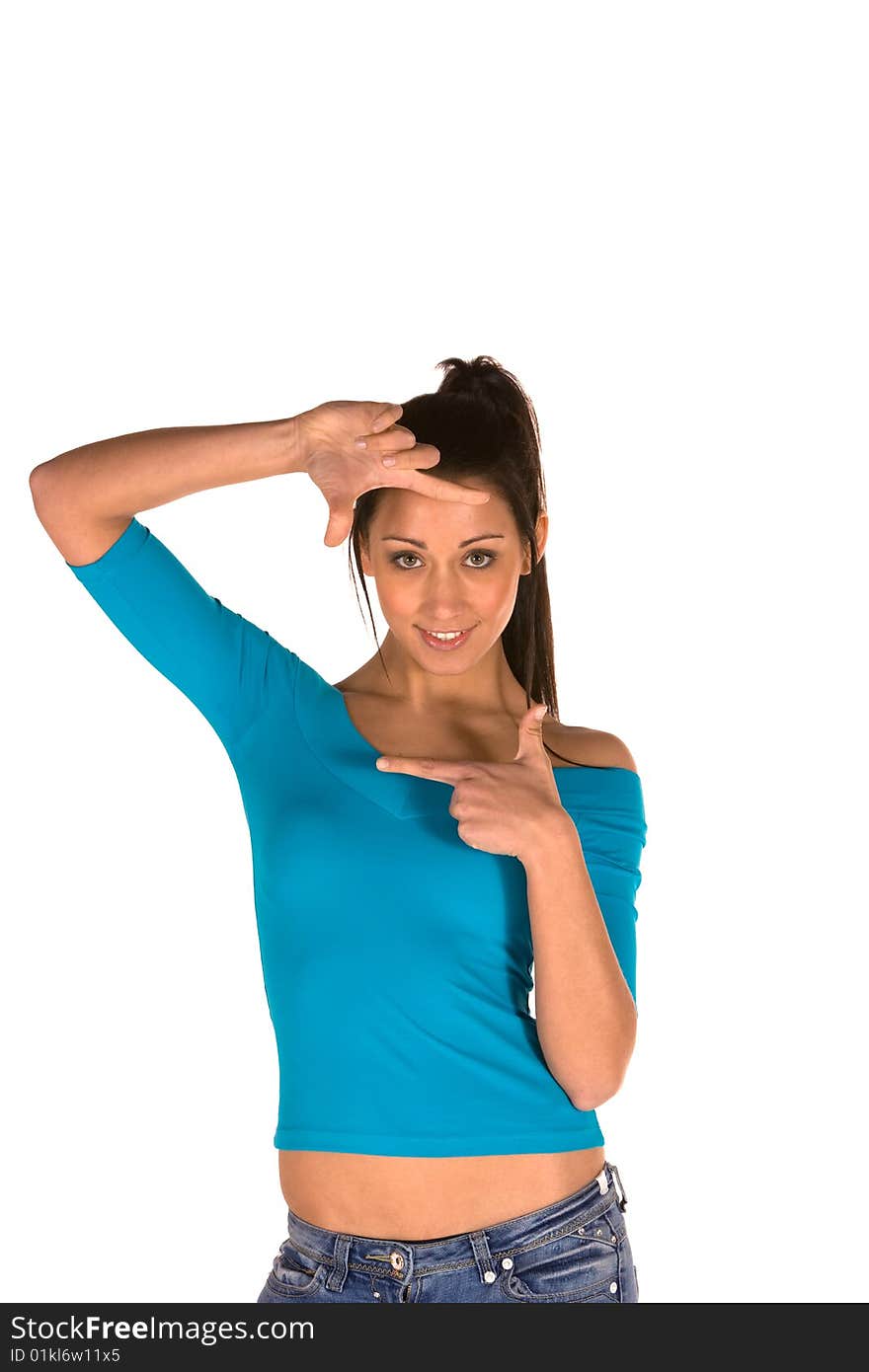 Young caucasian brunette,isolated on white wearing casual clothes,framing the face with hands. Young caucasian brunette,isolated on white wearing casual clothes,framing the face with hands