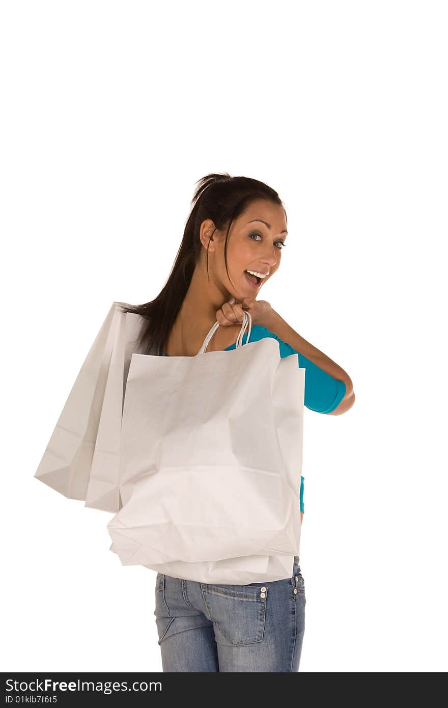 Young caucasian brunette with a bunch of white shopping bags,isolated on white,with happy expression. Young caucasian brunette with a bunch of white shopping bags,isolated on white,with happy expression.