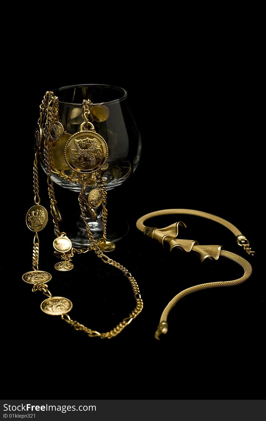 Costume jewelery placed on isolated black background