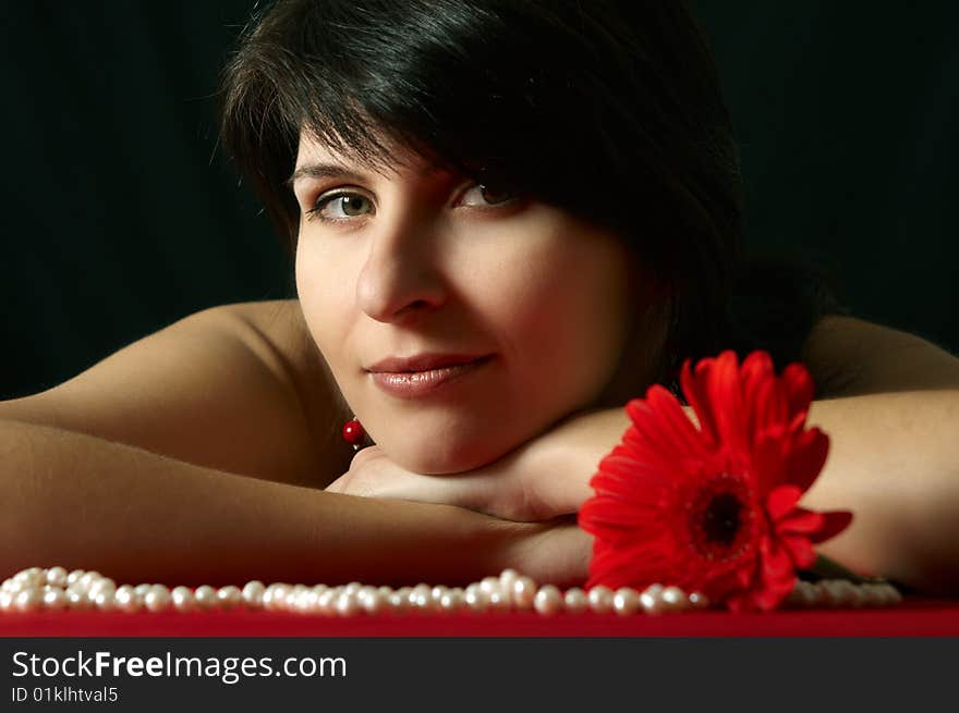 Young beautiful woman's portrait on black background. Young beautiful woman's portrait on black background