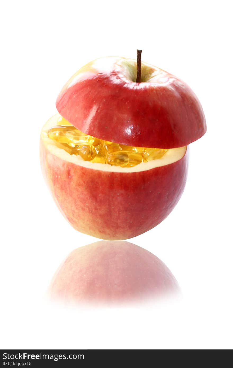 Isolated apple with vitamins inside