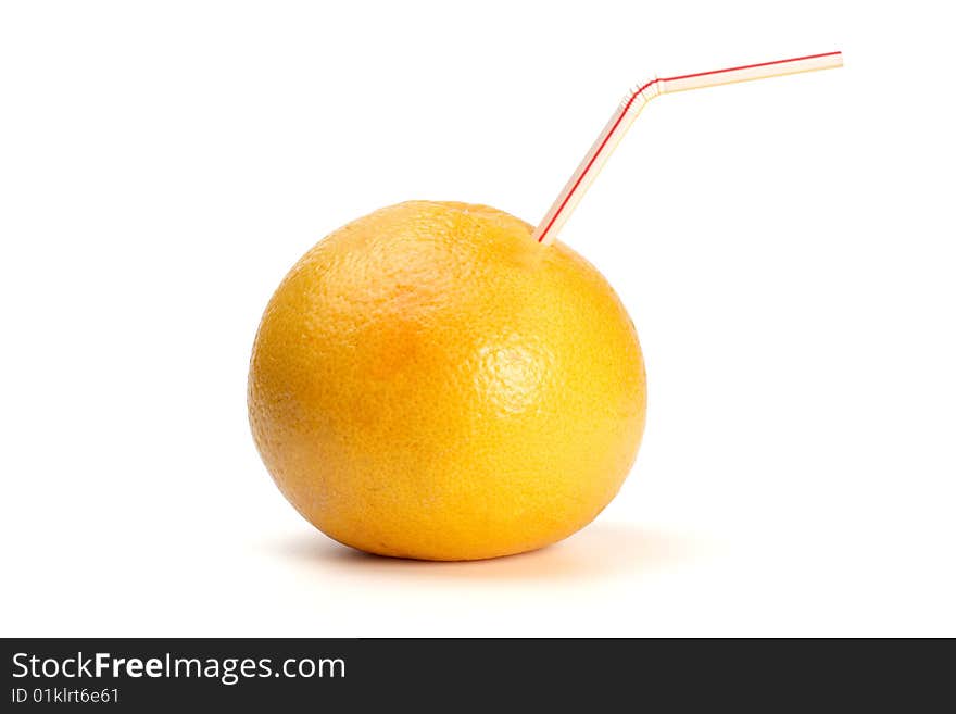 Grapefruit with straw isolated on white.  Idea of nature products, juices and healthy eating.