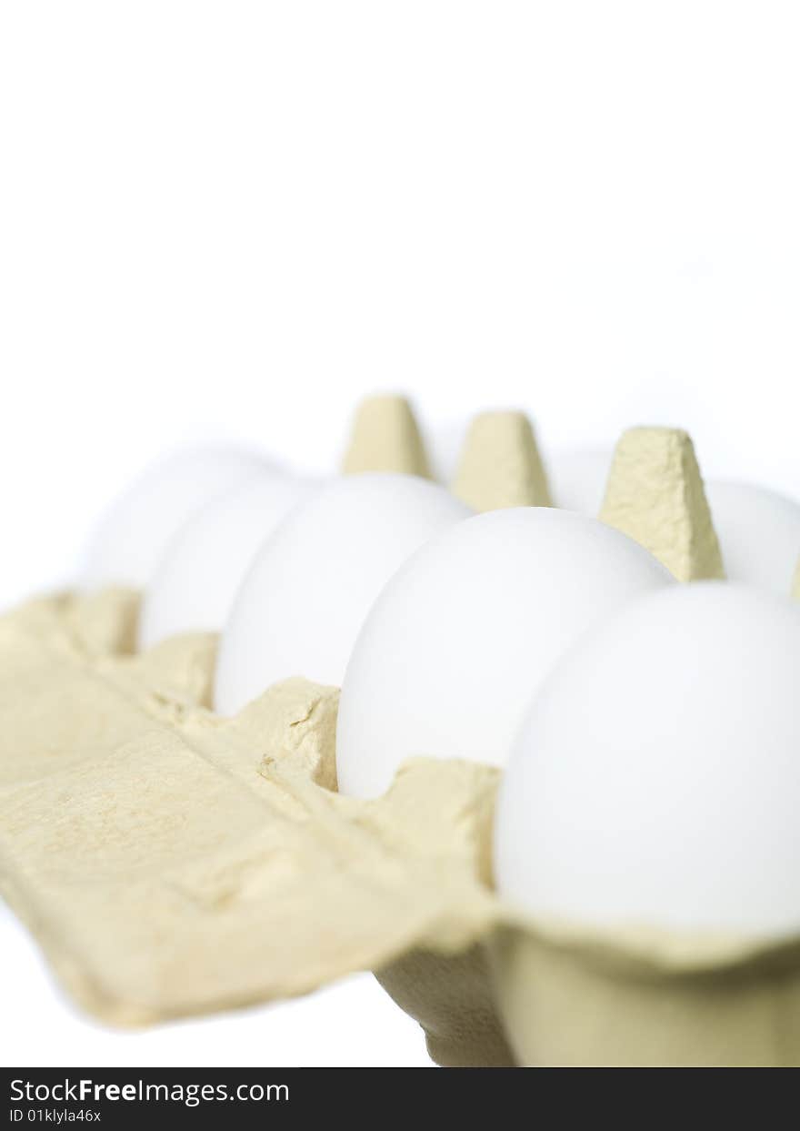 Egg carton towards white background