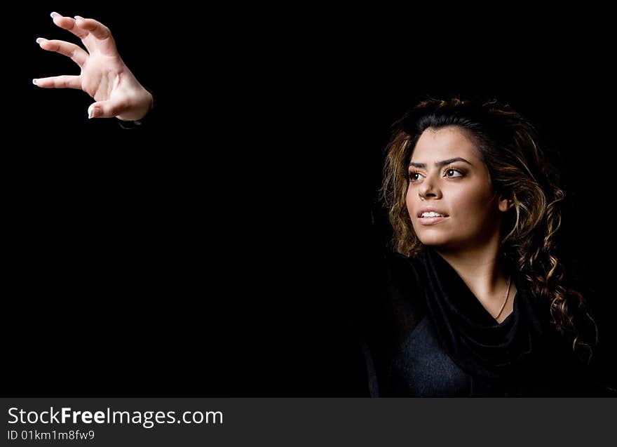 A portrait of beautiful female showing hand gesture