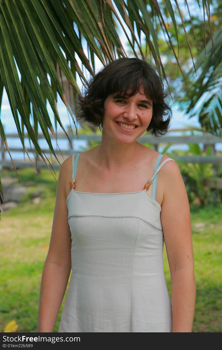 Woman In Tropical Garden