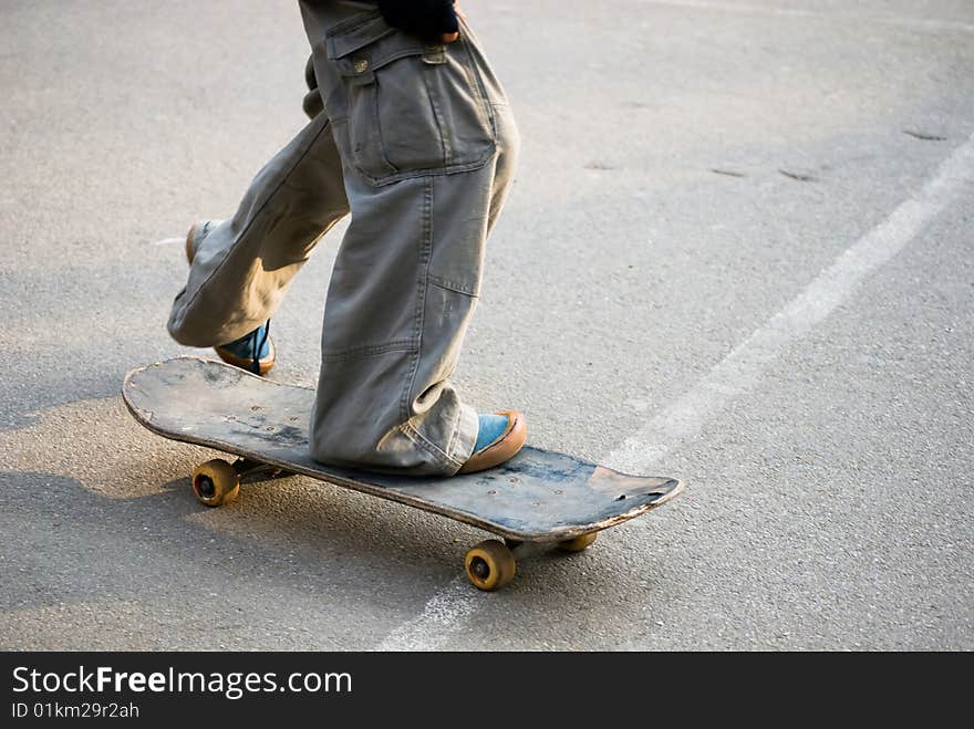 A skateboarder getting ready for a trick