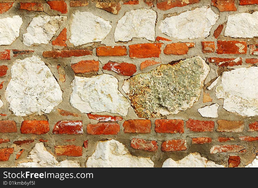 Rough wall from bricks and stones. Rough wall from bricks and stones