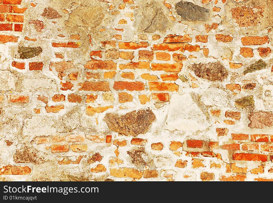 Rough wall from bricks and stones. Rough wall from bricks and stones