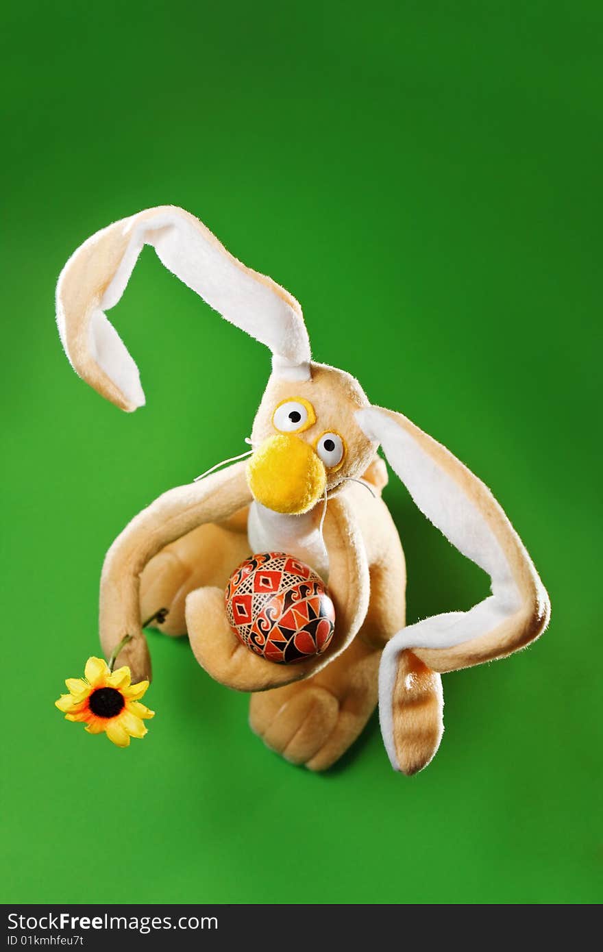 Funny Easter bunny with egg