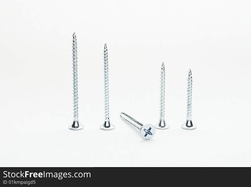 Five self drilling screws standing on it hats