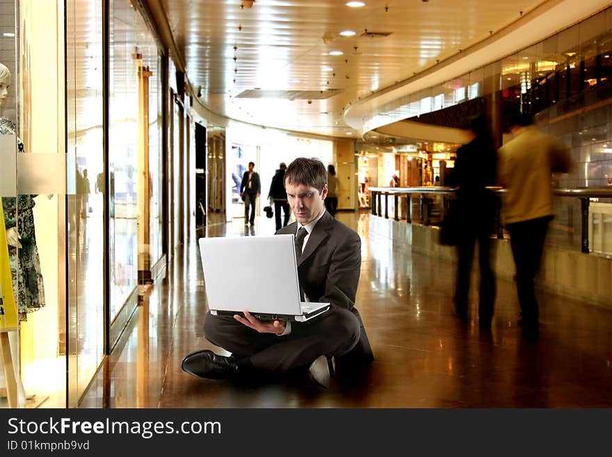 Business man using a laptop. Business man using a laptop