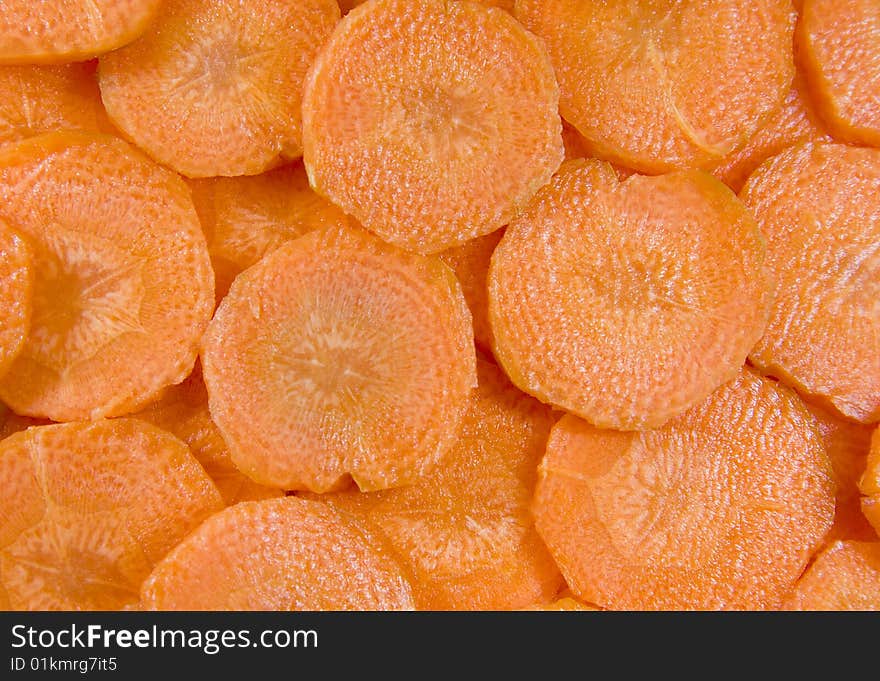 Multiple slices of carrots, and food ingredients