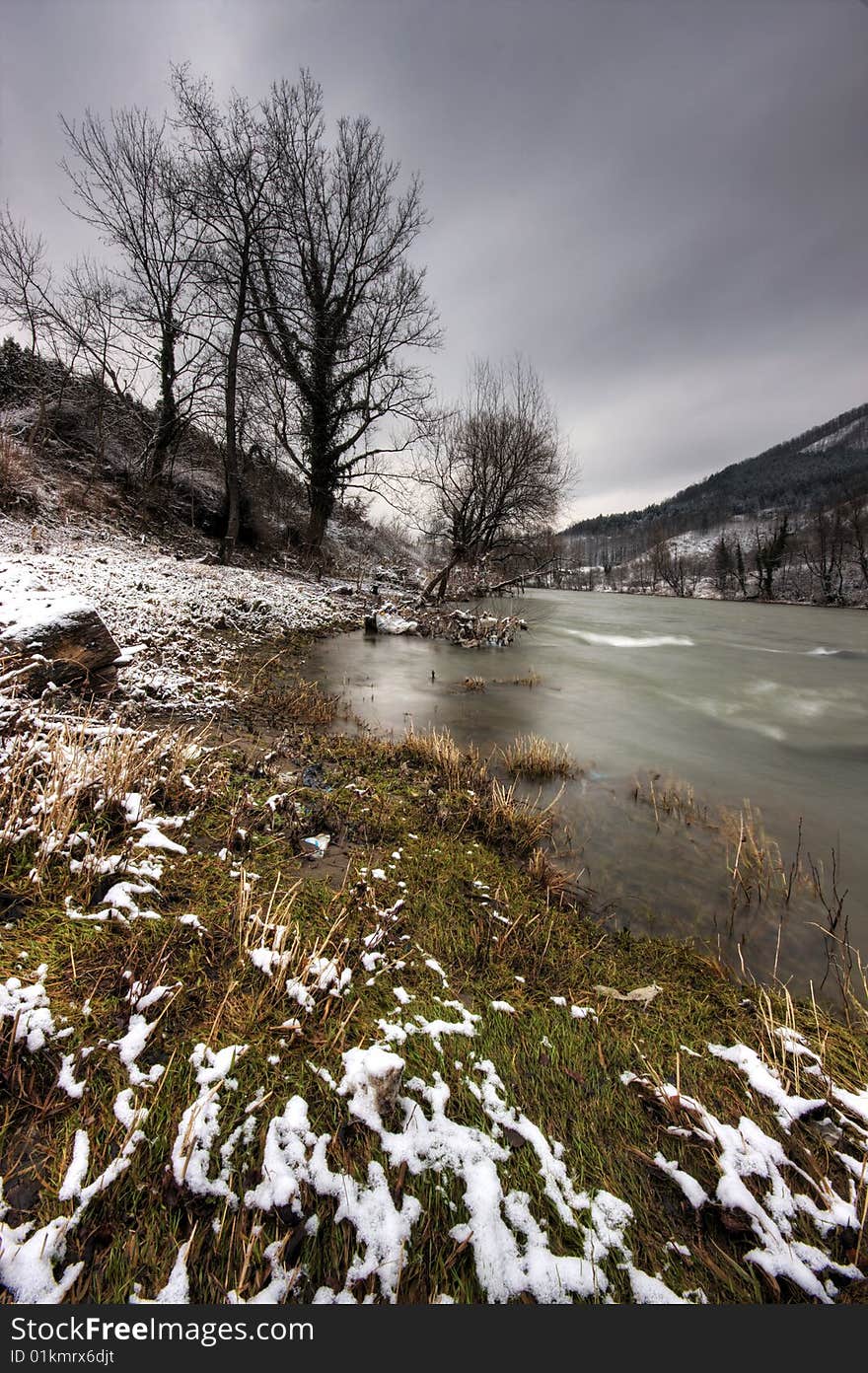 By the river