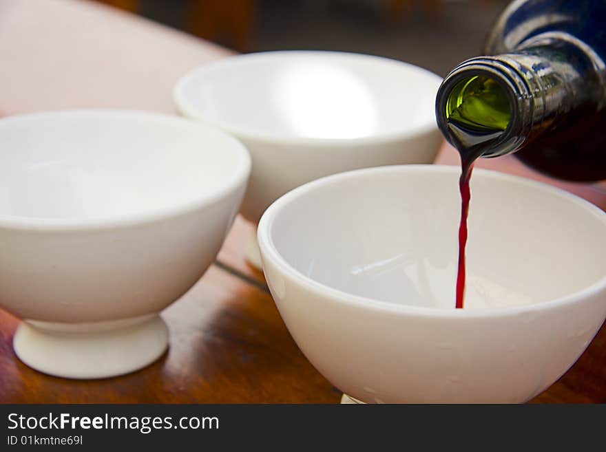 Bottle of wine served in the cup, drink. Bottle of wine served in the cup, drink