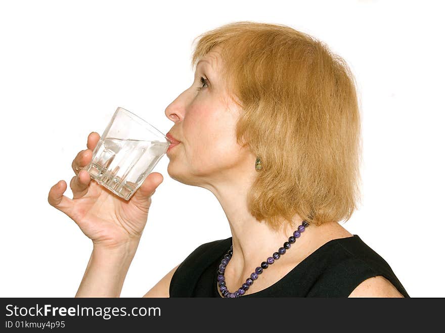 Woman, is insulated on white background, drink water from glass. Woman, is insulated on white background, drink water from glass