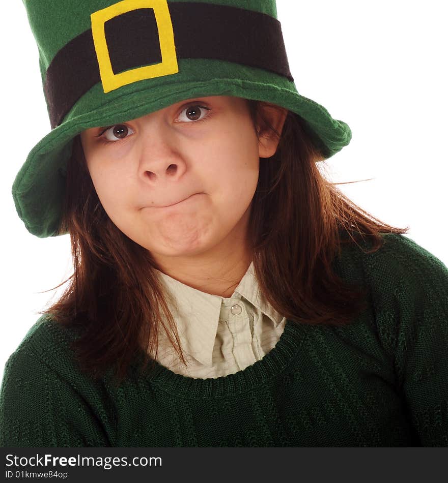 A close-up portrait of a preteen girl in St. Patrick's Day garb.  Isolated on white. A close-up portrait of a preteen girl in St. Patrick's Day garb.  Isolated on white.