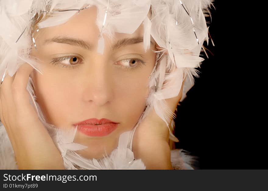 Beautiful Image of a Blond woman in feathers