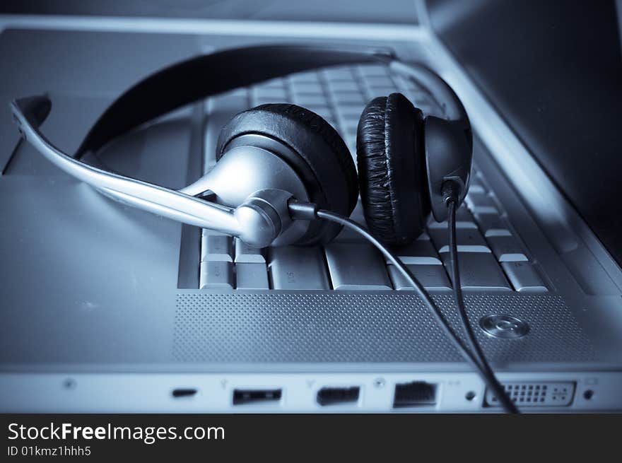 Close up of keyboard and headphones