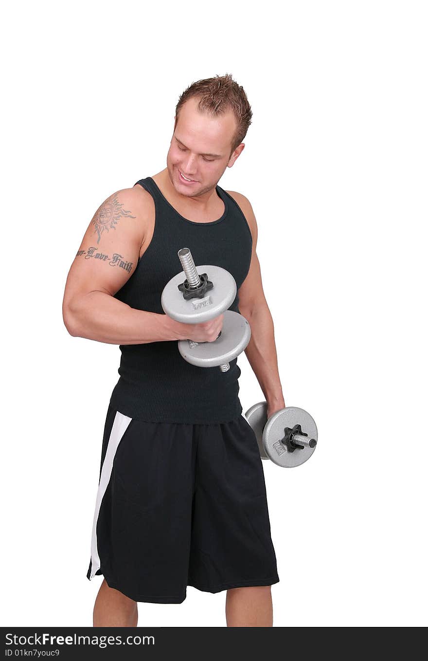 One fit adult man lifting steel weights in a black workout outfit over white. One fit adult man lifting steel weights in a black workout outfit over white