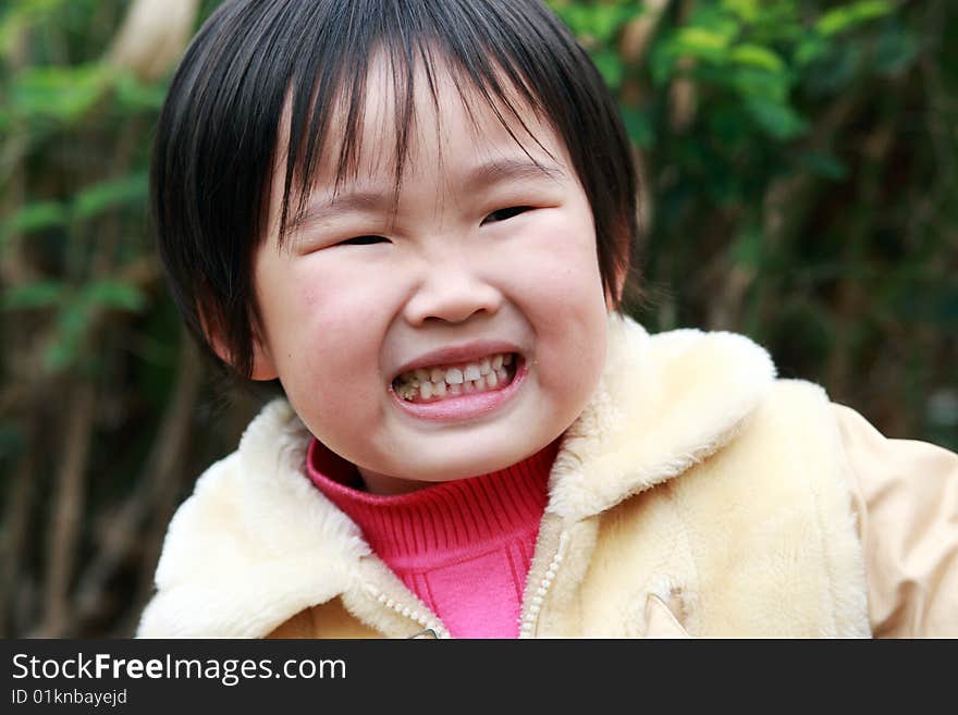 The lovely little girl in the park.