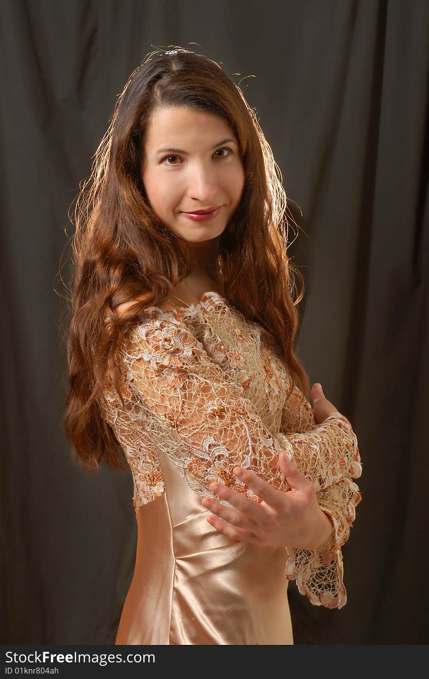 Portrait of beautiful woman on black background