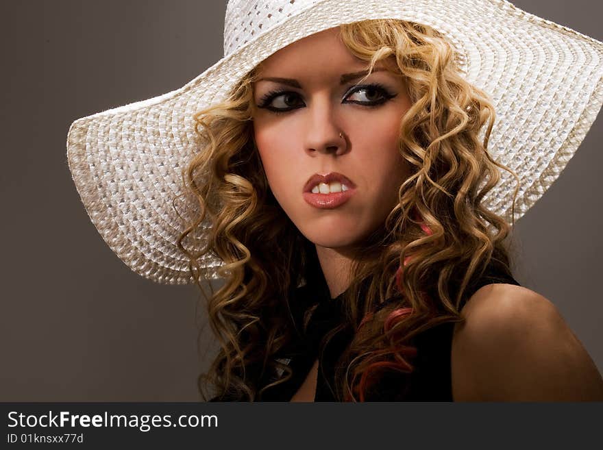 Hot sensual blond with hat