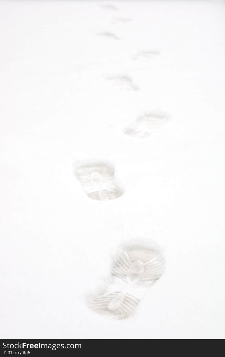 Traces of man in the snow. Traces of man in the snow