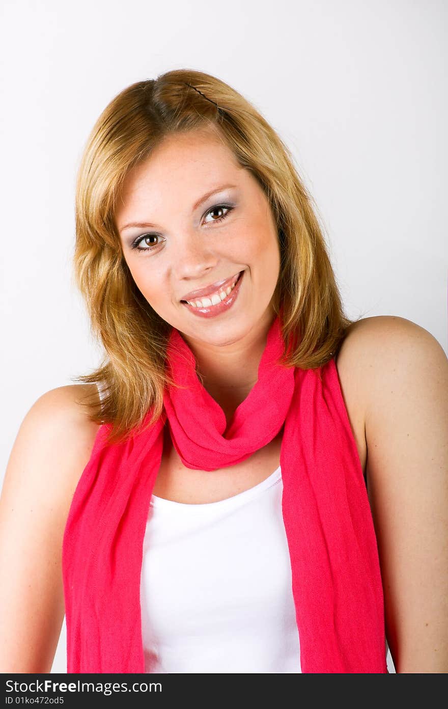 Beauty portrait of a woman on grey background. Beauty portrait of a woman on grey background