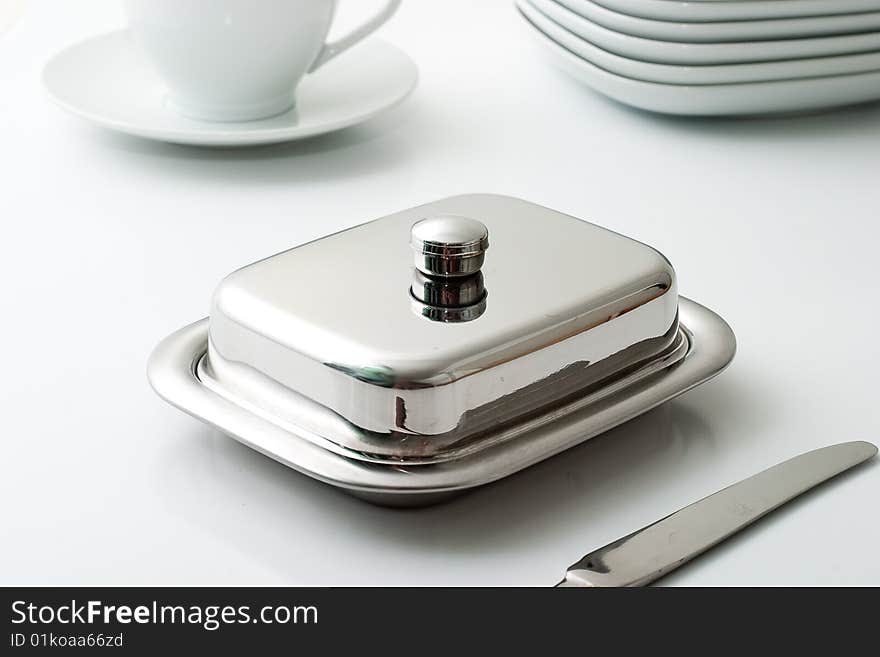 Dishware on a light background. The concept for a restaurant or cafe.