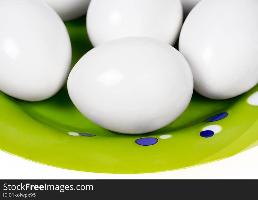 Closed-up easter eggs on plate on white background. Closed-up easter eggs on plate on white background