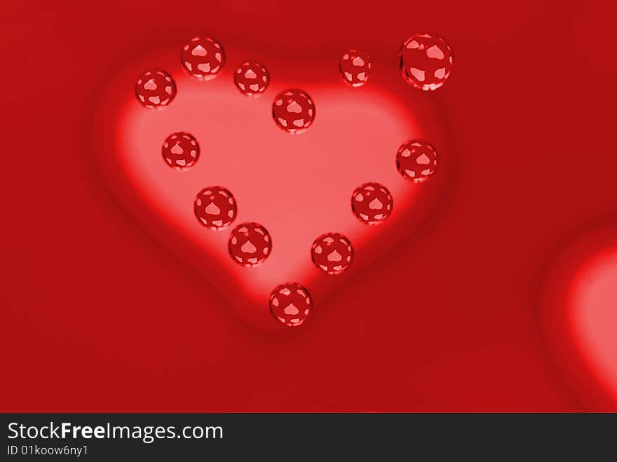 Water drops in the form of heart on a multi-coloured celebratory background